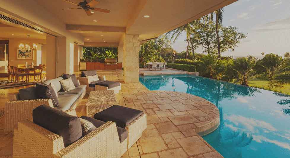 Beautiful home with open deck, deck furniture and pool